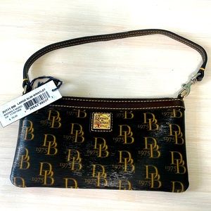 NWT Dooney and Bourke large slim wristlet. Brown T Moro